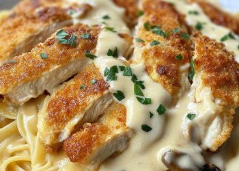 Hähnchenstreifen mit Champignon-Rahmsauce